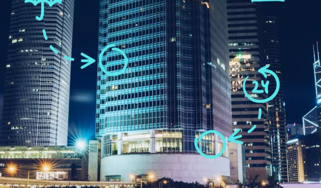 office building with icons symbolizing monitoring